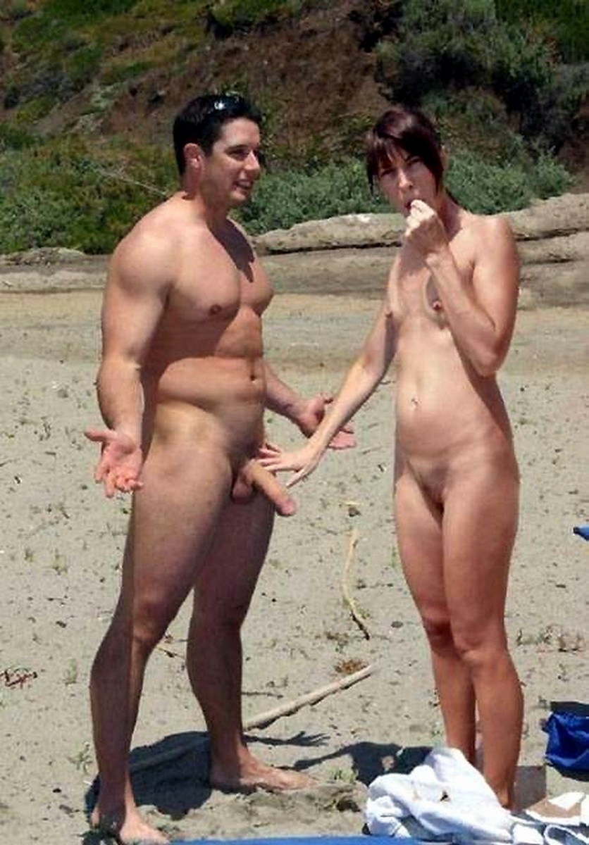 Nudist shaved handjob dick on beach