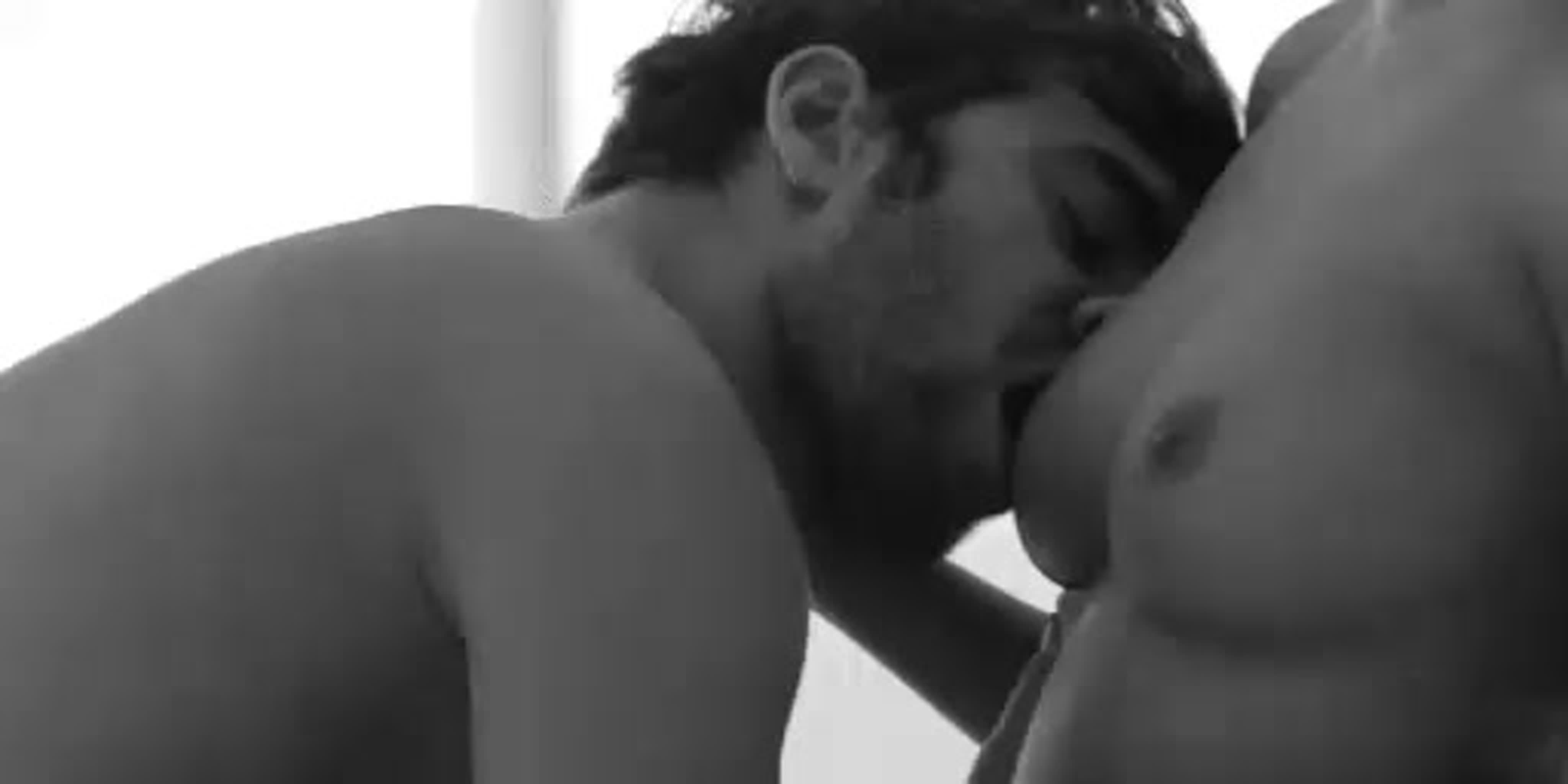 Nude couple kissing lips
