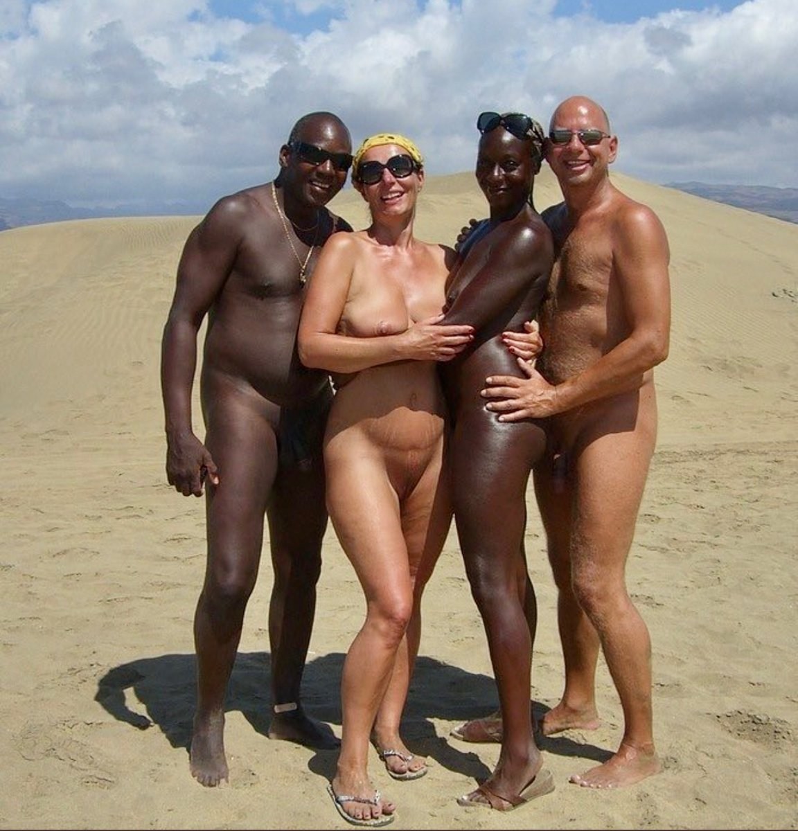 Ebony black suck penis on beach